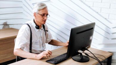 older job seekers get fewer job offers on linkedin - senior using computer