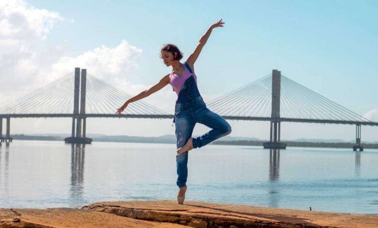 yoga for anxiety - woman doing yoga near bridge
