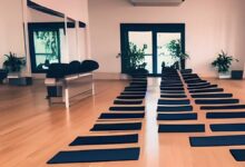 benefits of chair yoga -row of yoga chairs in a yoga studio
